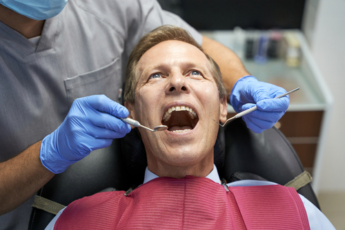man at the dentist